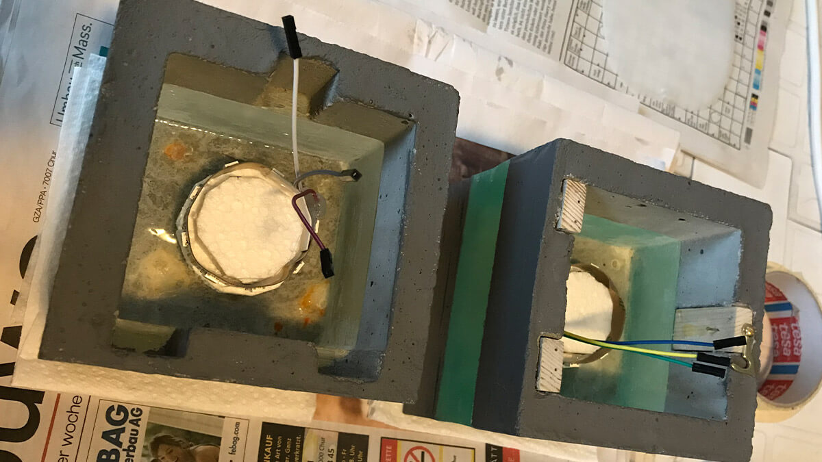 Dreischichtige Gussgehäuse für den Epoxycube